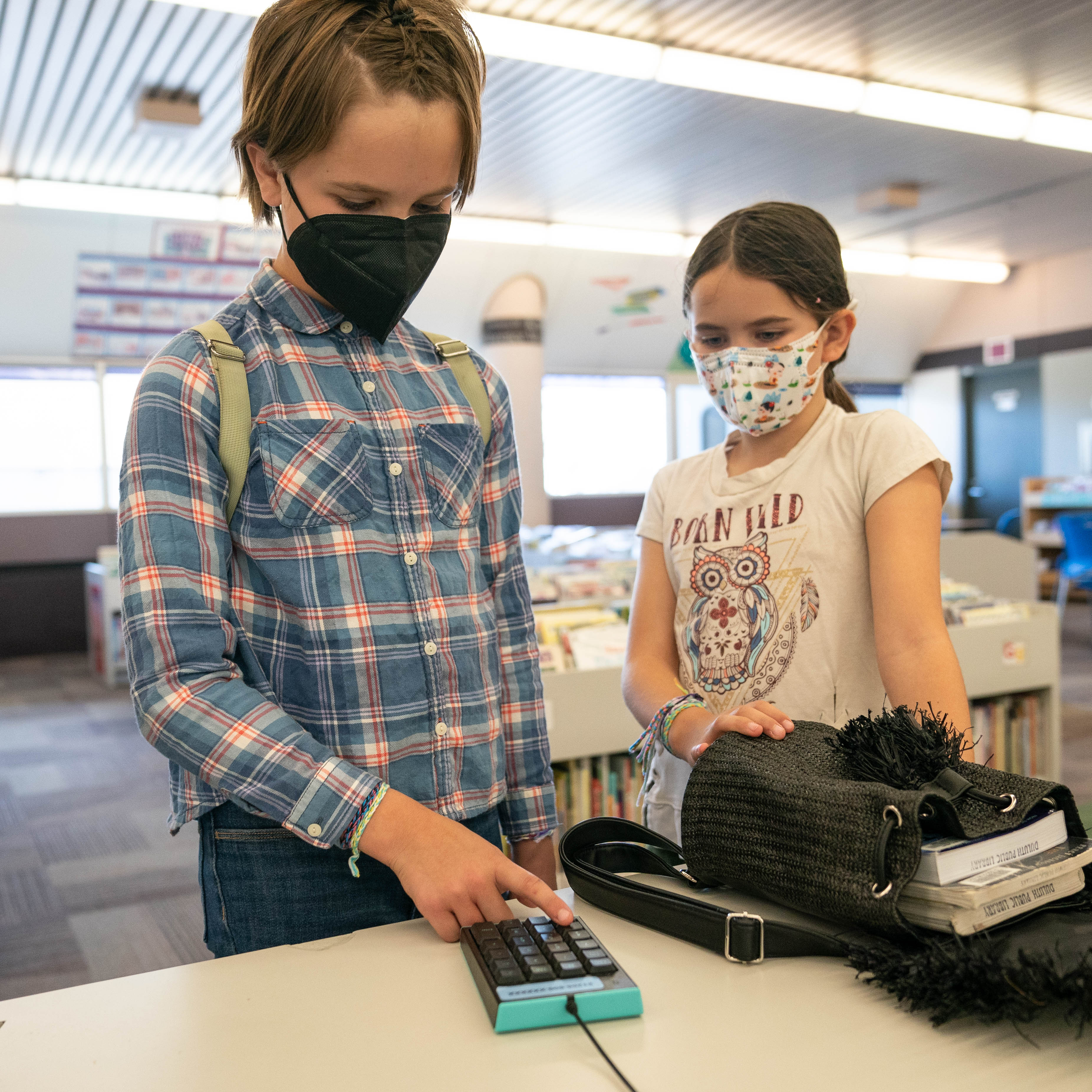 Iris Granger and her sister try out one of the new PORT CARD pads.