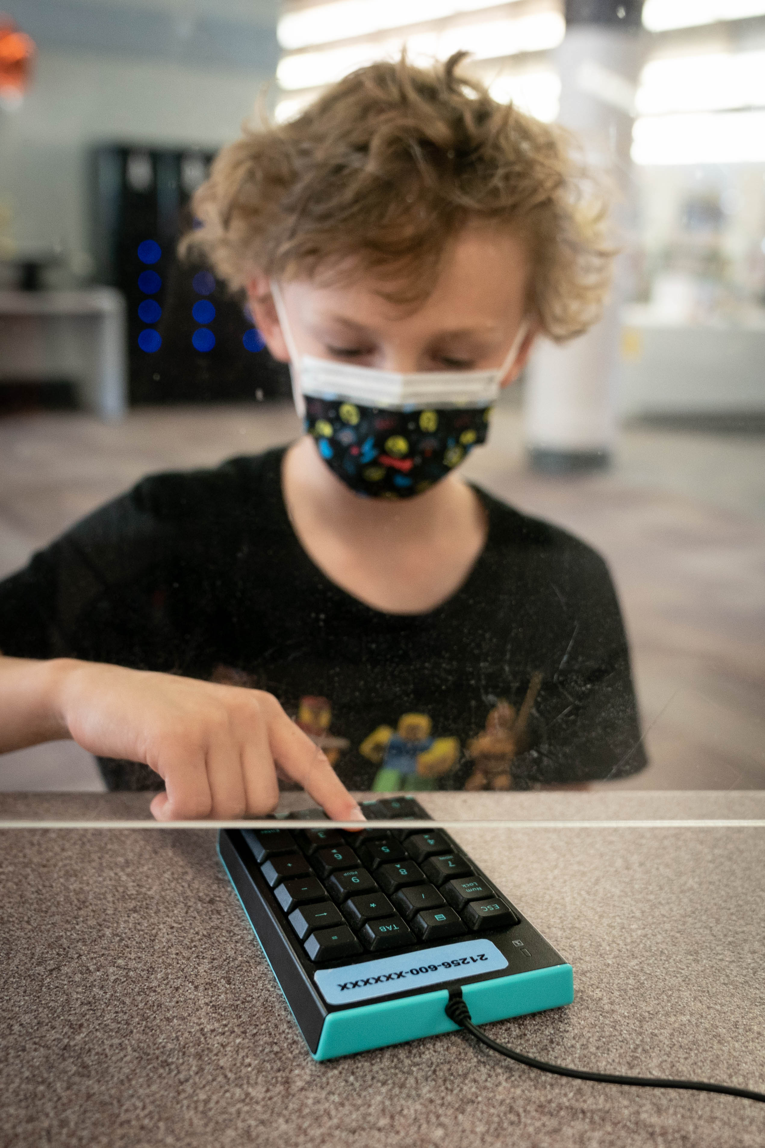 ISD709 3rd grade student Eddie tried typing his student ID number into a pad at the Duluth Public Library.